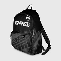 Рюкзак Opel speed на темном фоне со следами шин: символ с