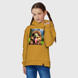 Толстовка оверсайз детская Забавный орел с высунутым языком в горах, цвет: горчичный — фото 2