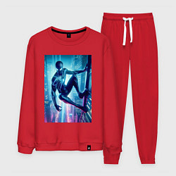 Мужской костюм Чувак-паук висит на стене небоскрёба