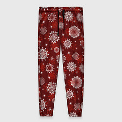 Женские брюки Snowflakes on a red background